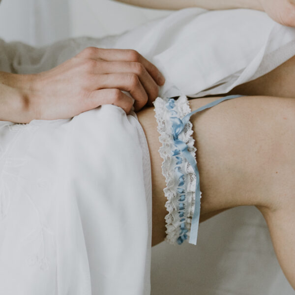 Amelia Nottingham lace garter with blue silk bow