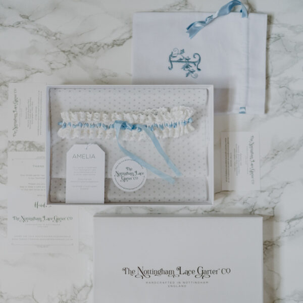 Amelia Nottingham lace garter with blue silk bow