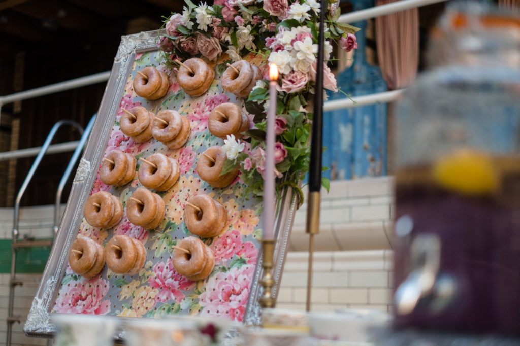 A Black, Gold & Purple Wedding at Victoria Baths with Vintage Embroidered Napkins and donuts