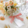 Embroidered ribbon bows for place setting