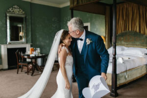 Bride with Father of the bride morning of the wedding with personalised handkerchief