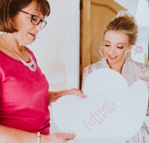 Mother of the Bride morning of the wedding with personalised lace handkerchief