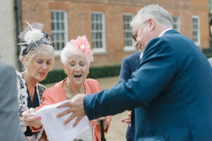 Bride with Father of the bride morning of the wedding with personalised handkerchief