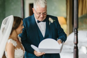 Bride with Father of the bride morning of the wedding with personalised handkerchief