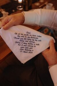 Bride with Father of the bride morning of the wedding with personalised handkerchief
