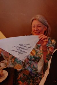 Bride with Mother of the bride morning of the wedding with personalised handkerchief