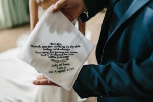 Bride with Father of the bride morning of the wedding with personalised handkerchief